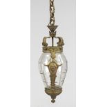 Ceiling lantern, late 19th century, faceted glass body in ornamented frame with mascarons and crown.