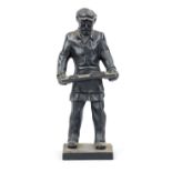 Anonymous sculptor, mid-20th century, standing worker with goggles and mold, black patinated cast