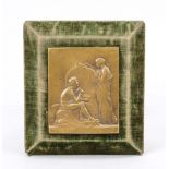 Bronze relief, 1st half 20th century A naked youth with hammer and chisel, sitting on ancient ruins,