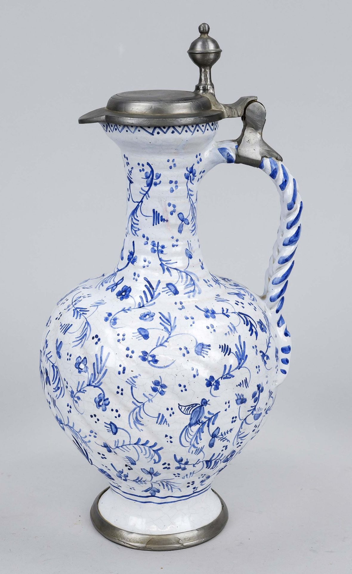 A narrow-necked jug, Hanau 1776, faience, pale blue glaze with bird decoration in dark blue hot-fire