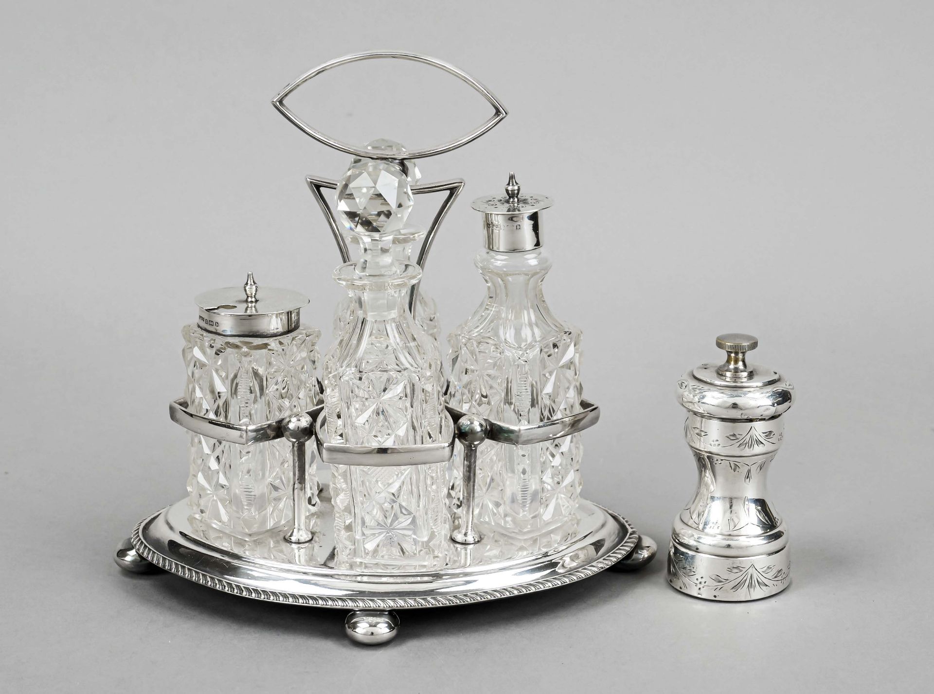 Cruet, England, 20th century, plated, oval stand on 4 pressed feet, central handle and holder for