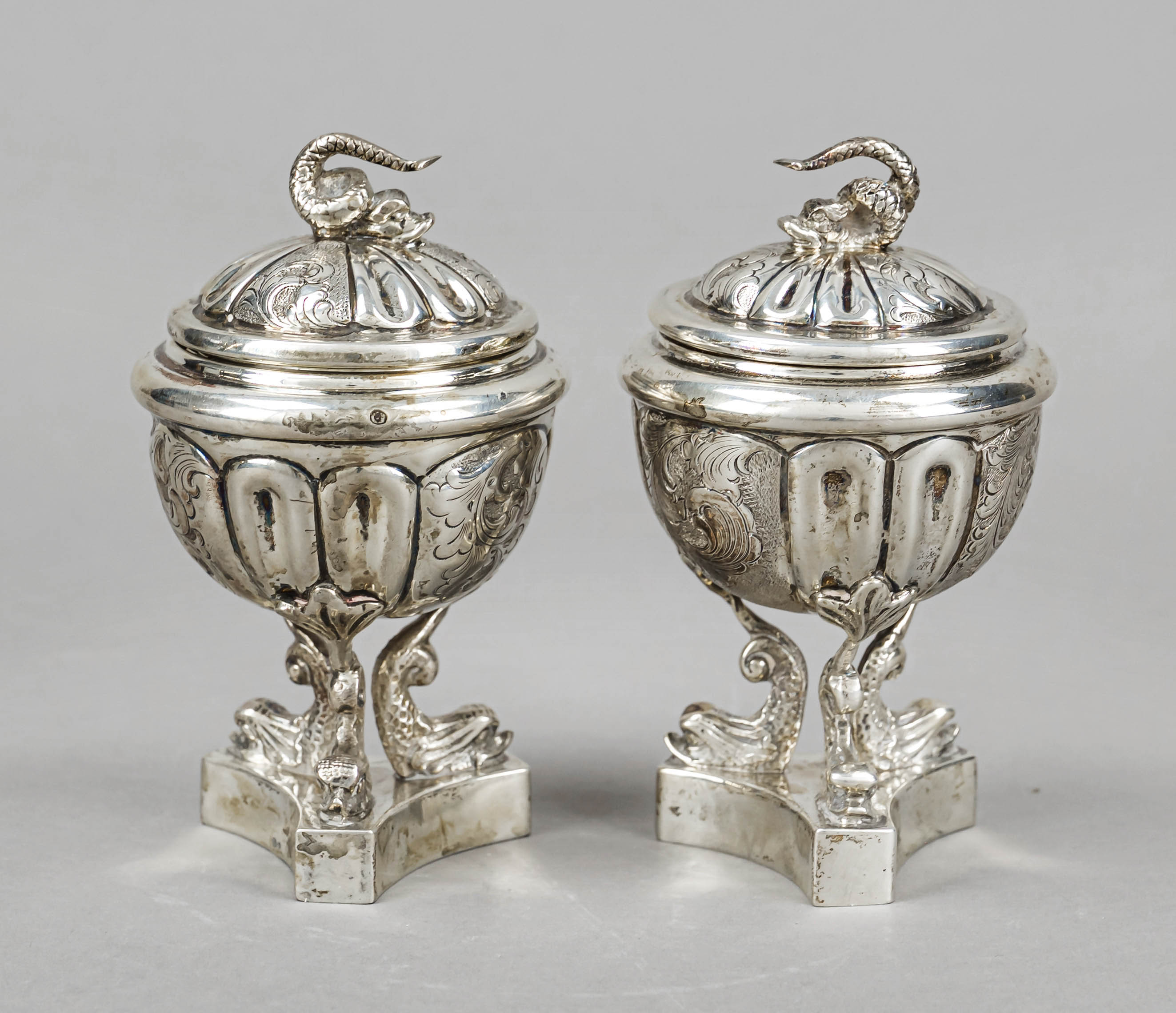 Pair of lidded vessels, Italy (?), early 20th century, silver 835/000, 3-pass stand, vessel on 3