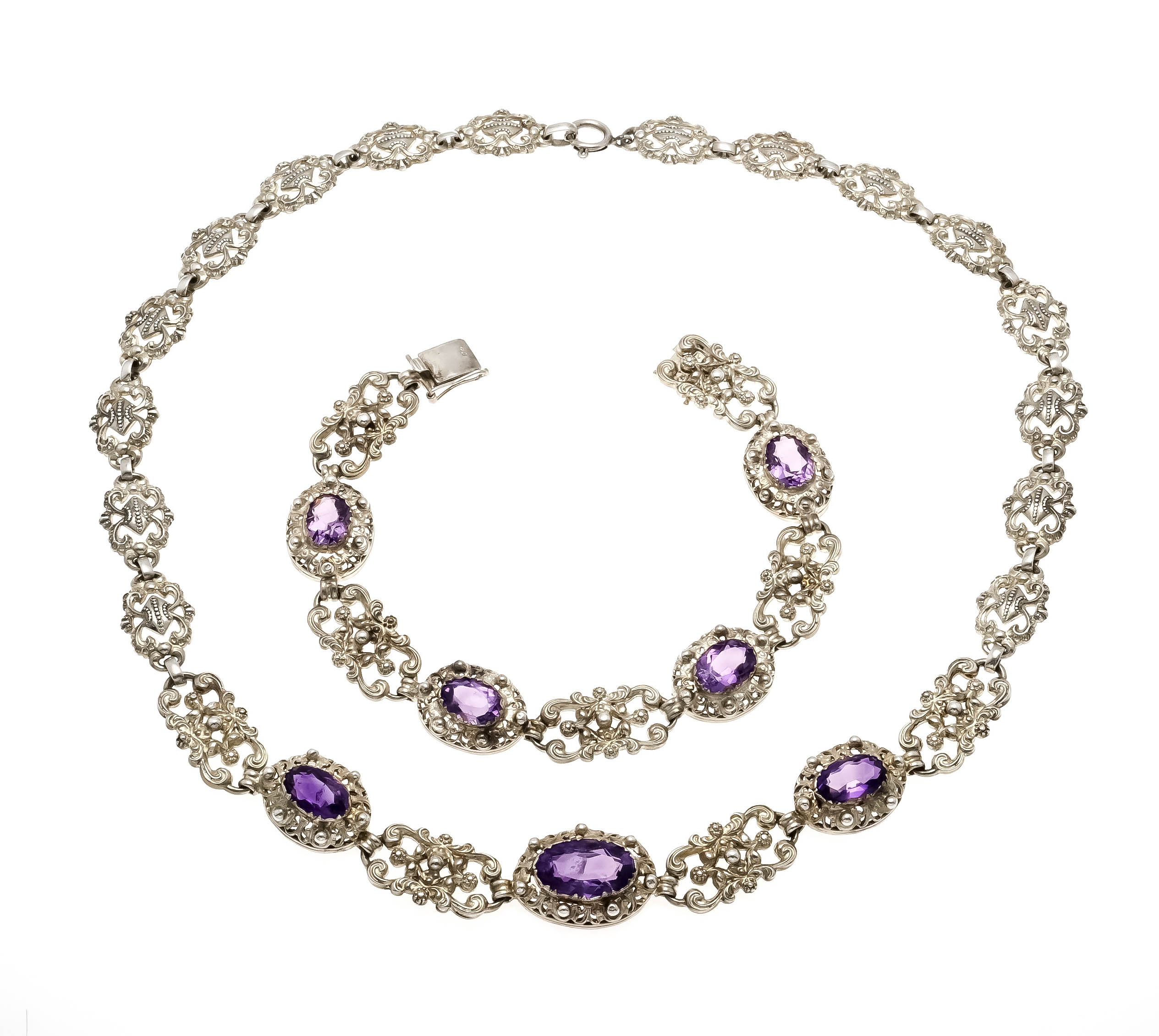 2-piece amethyst set, silver 830/000, made of richly decorated ornamental links in historicism