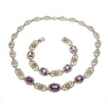 2-piece amethyst set, silver 830/000, made of richly decorated ornamental links in historicism