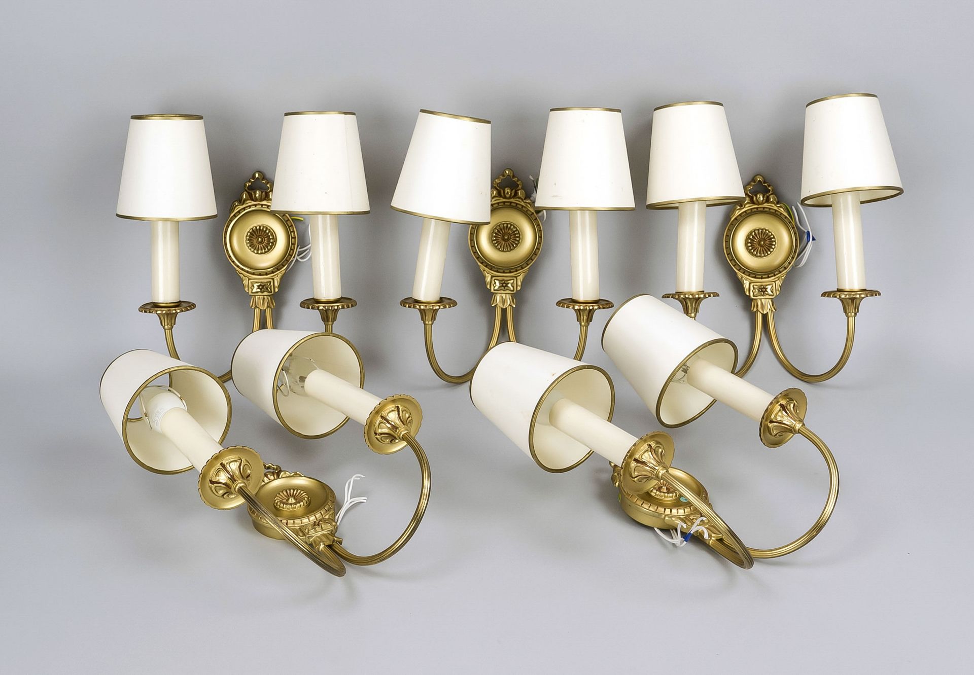 Set of 5 wall lamps in classicist style, 20th century, partly matted brass, h. 30 cm