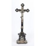 Baroque crucifix. 18th century, ebonized wood (rubbed), Jesus and the applications made of silver,