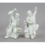 2 Blanc de Chine figures, China 19th/20th century, saints/ascetics on seated animals (1 x dragon,