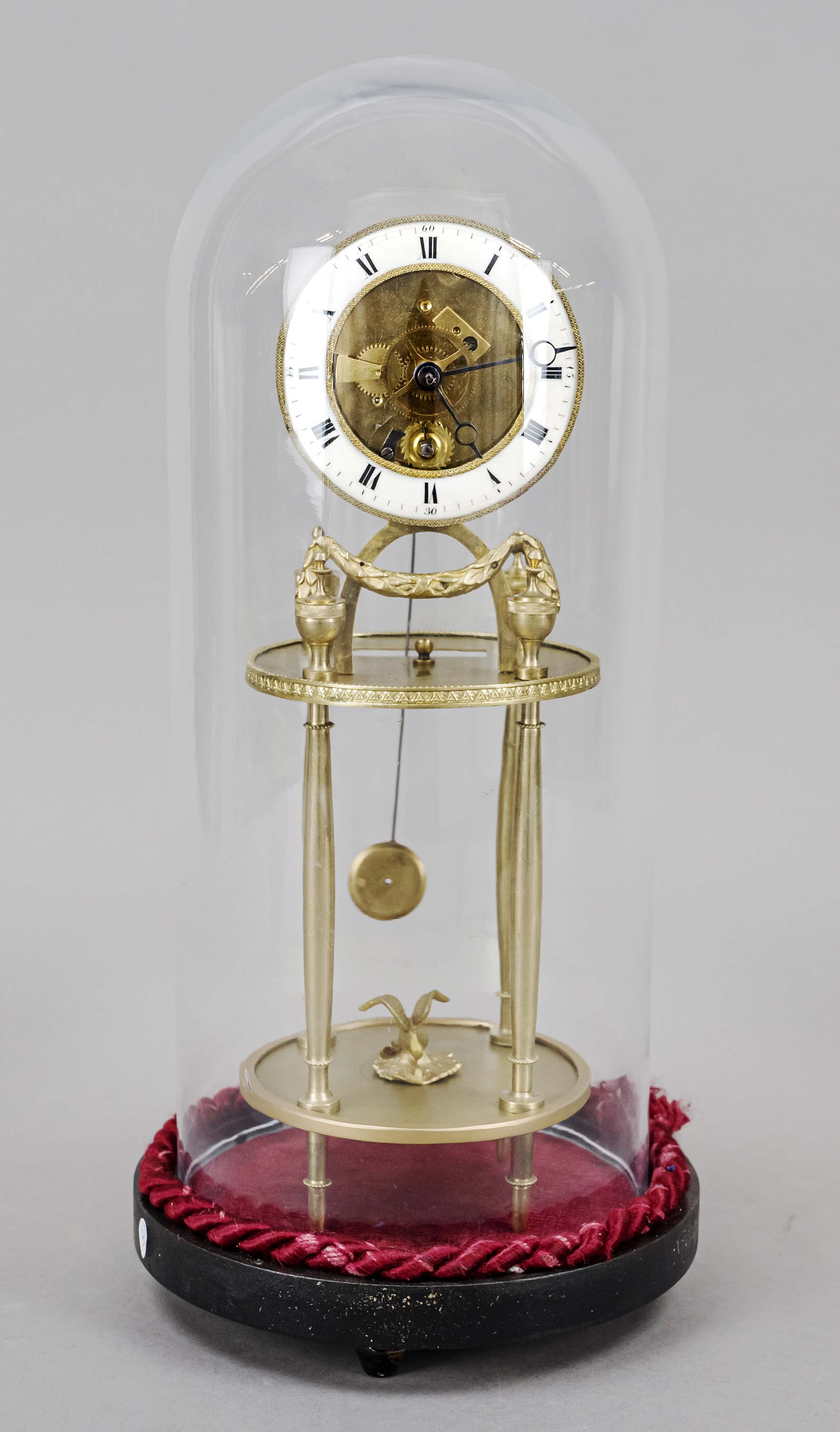4 Column clock with base and glass dome, 1st half 19th century, gilt brass, decorated with