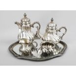 A four-piece coffee and tea set on an oval tray, German, 20th century, silver 800/000, the