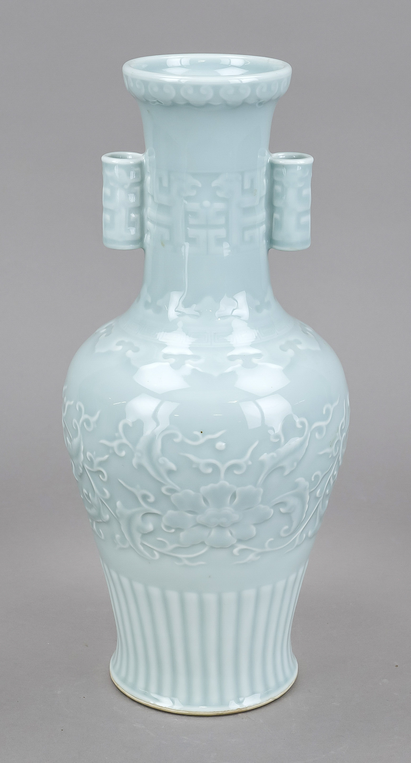 Monochrome vase, China, 20th century, baluster shape with tubular handles, molded relief decoration,