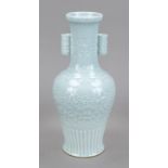 Monochrome vase, China, 20th century, baluster shape with tubular handles, molded relief decoration,