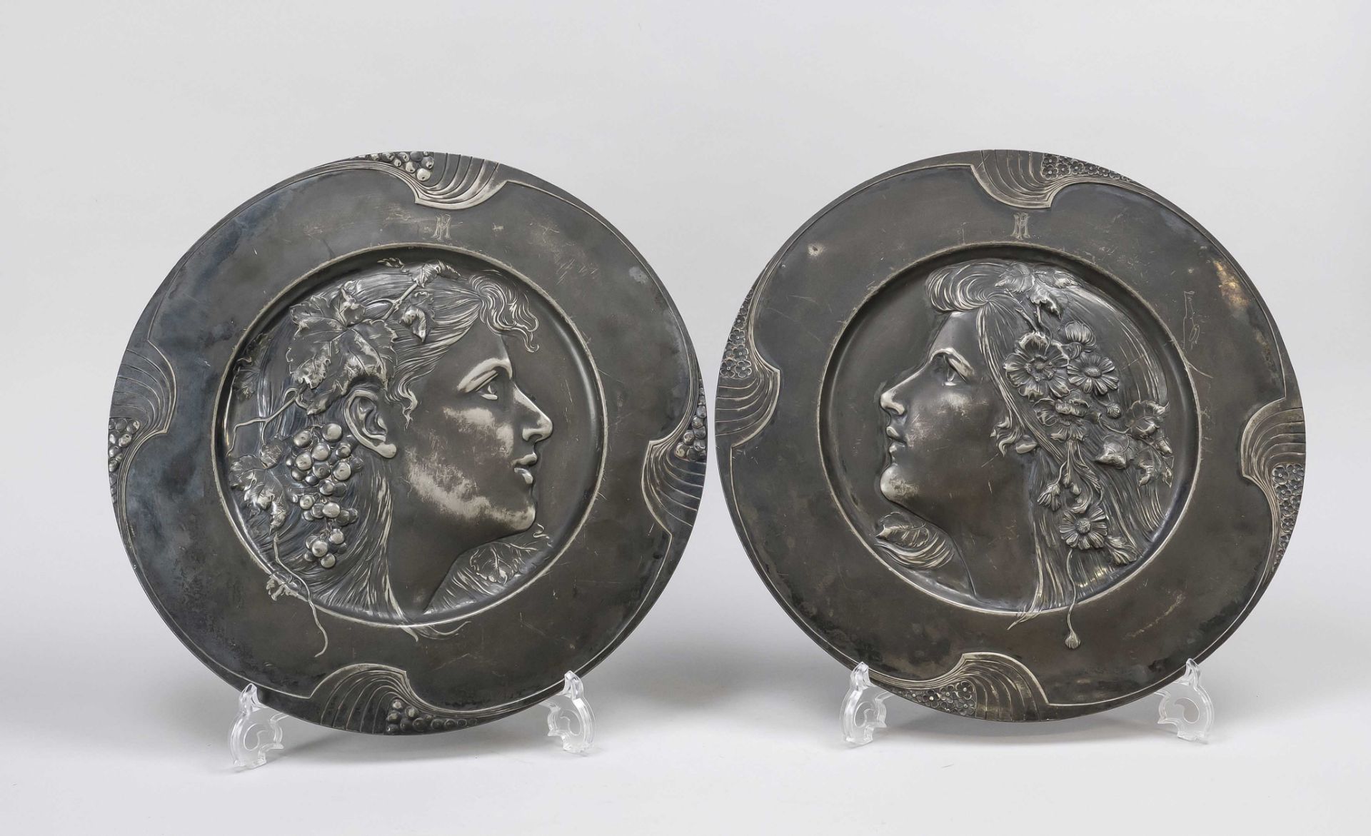 Pair of Art Nouveau decorative plates, Germany around 1910, pewter. In the mirror, the season autumn