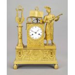 Empire pendulum, 1st half 19th century, fire-gilt bronze, a woman surrounded by musical