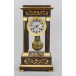 A portal clock, walnut, 2nd half 19th century, with floral maple inlays in the base and top,