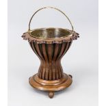 Teestoof, Holland 19th century, mahogany basket with slightly curved walls on 3 ball feet, brass