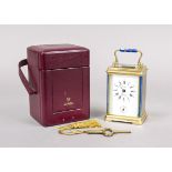 French. Travel alarm clock, marked ''La Valle - Mossa'', circa 1995, solid brass gilt, faceted on