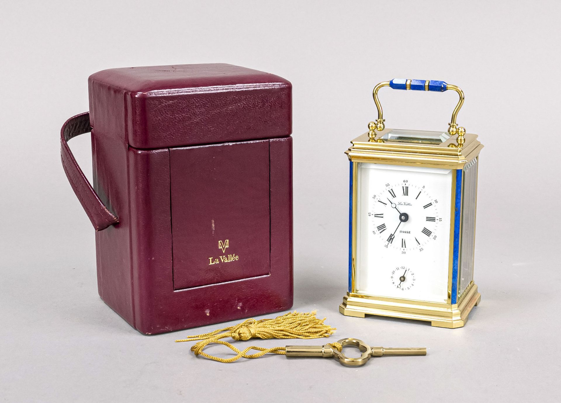 French. Travel alarm clock, marked ''La Valle - Mossa'', circa 1995, solid brass gilt, faceted on