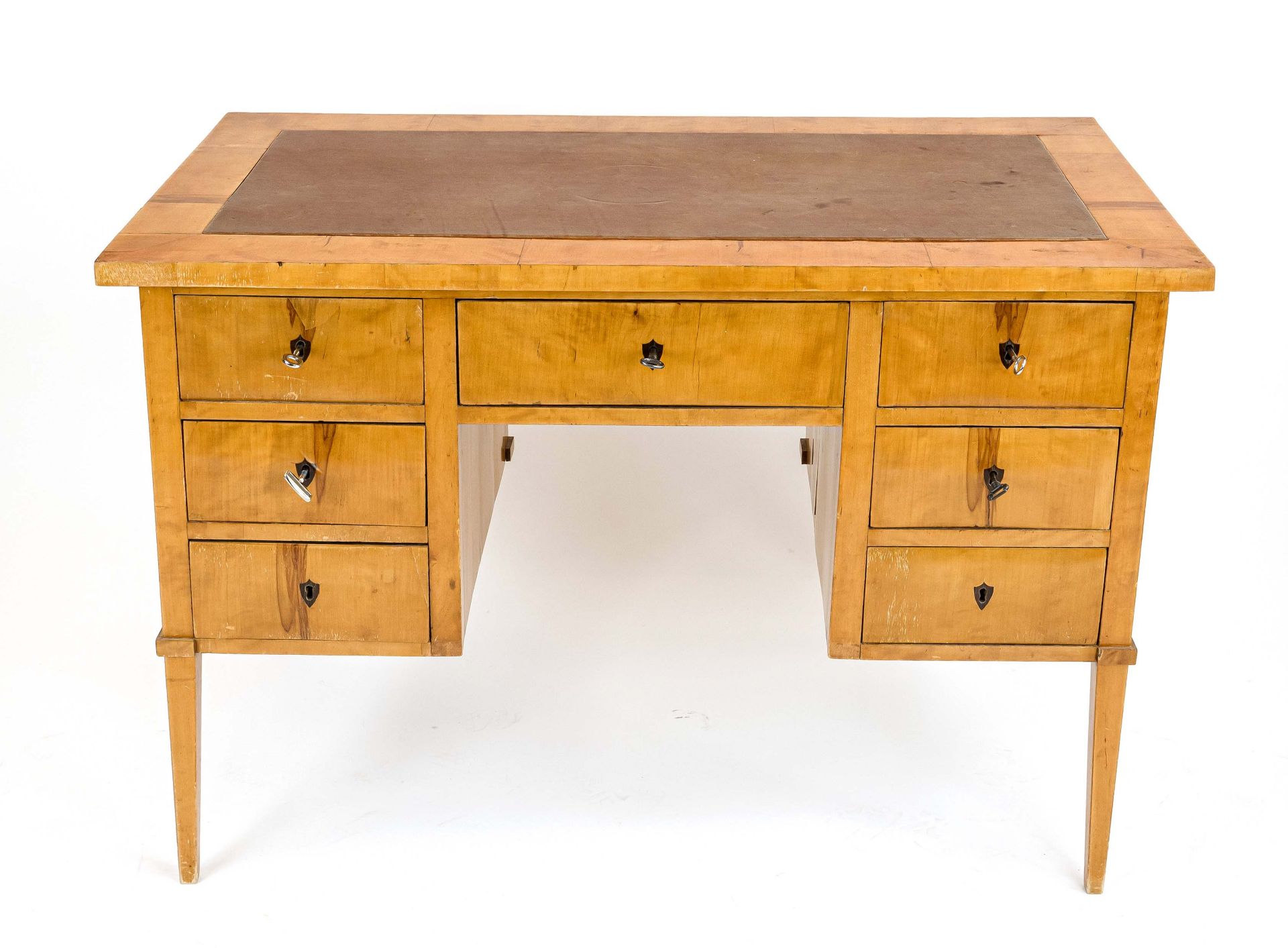 A Biedermeier-style desk, around 1900, birch, seven lockable drawers, top with leather cover, 78 x