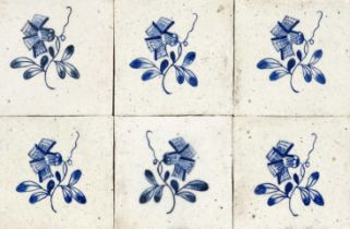 14 tiles, Holland, 20th century, cobalt blue, vegetal decoration, slightly rubbed, each 13 x 13 cm