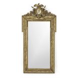 Wall mirror, c. 1900, stuccoed and gilded wooden frame, patinated, mirror with facet cut, 132 x 63