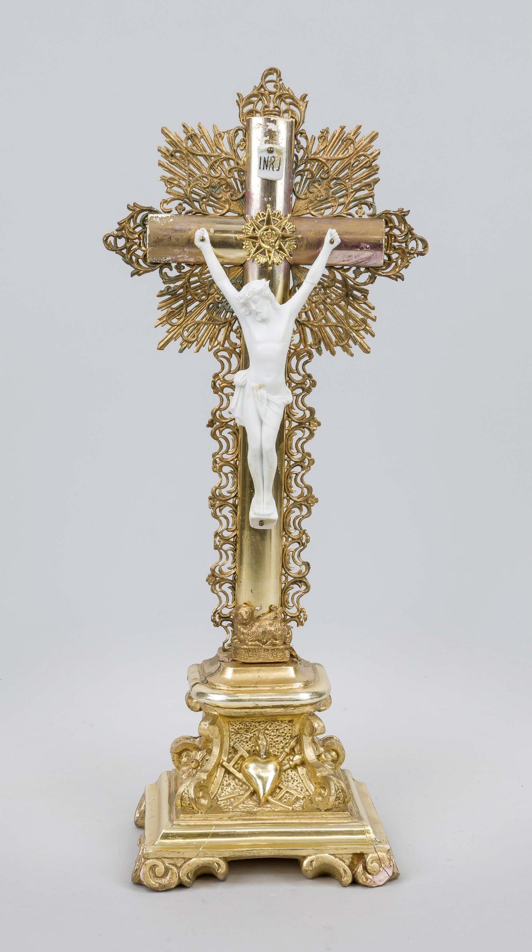 Christ on the cross, late 19th century, bisque porcelain figure of Christ on a wooden cross on an