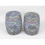 Pair of garden stools, China, probably 1st half 20th century, blue-ground Famille Rose decoration