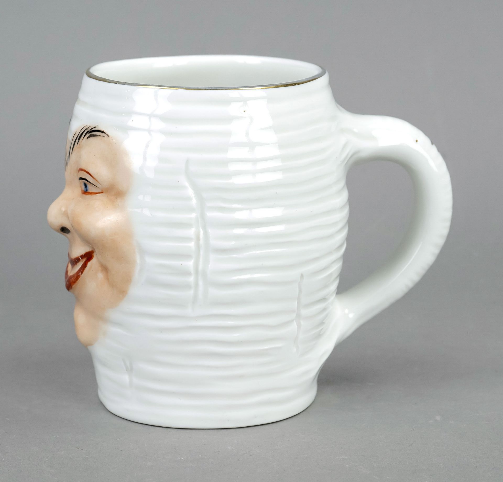 Student's beer mug, Meissen, mark after 1934, 1st choice, joke mug with relief wall, a laughing face - Image 2 of 2