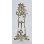 Small easel in historicist style, 20th century, nickel-plated brass, relief in typical style, h.