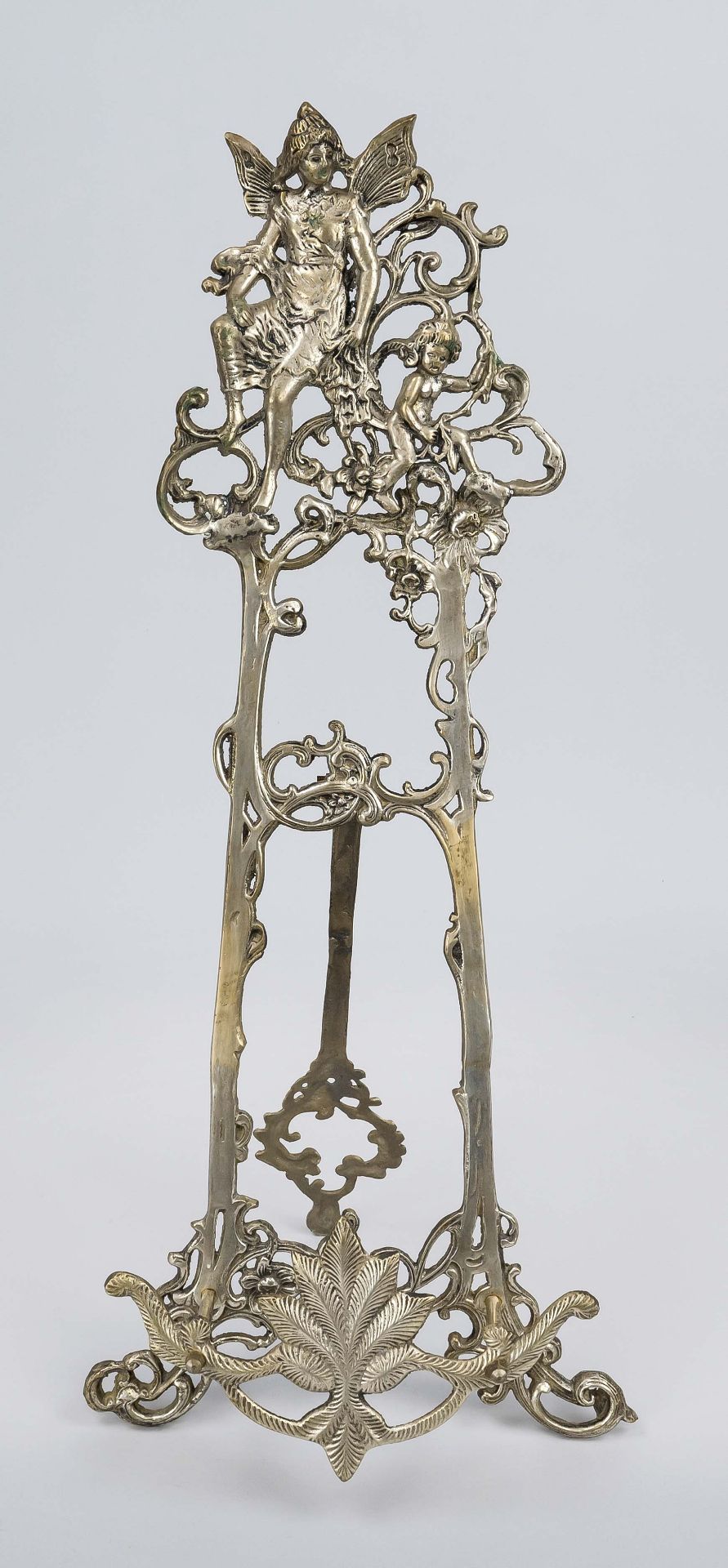 Small easel in historicist style, 20th century, nickel-plated brass, relief in typical style, h.