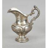 A Biedermeier cream jug, mid-19th century, unmarked, hallmarked silver, round base, bulbous body,
