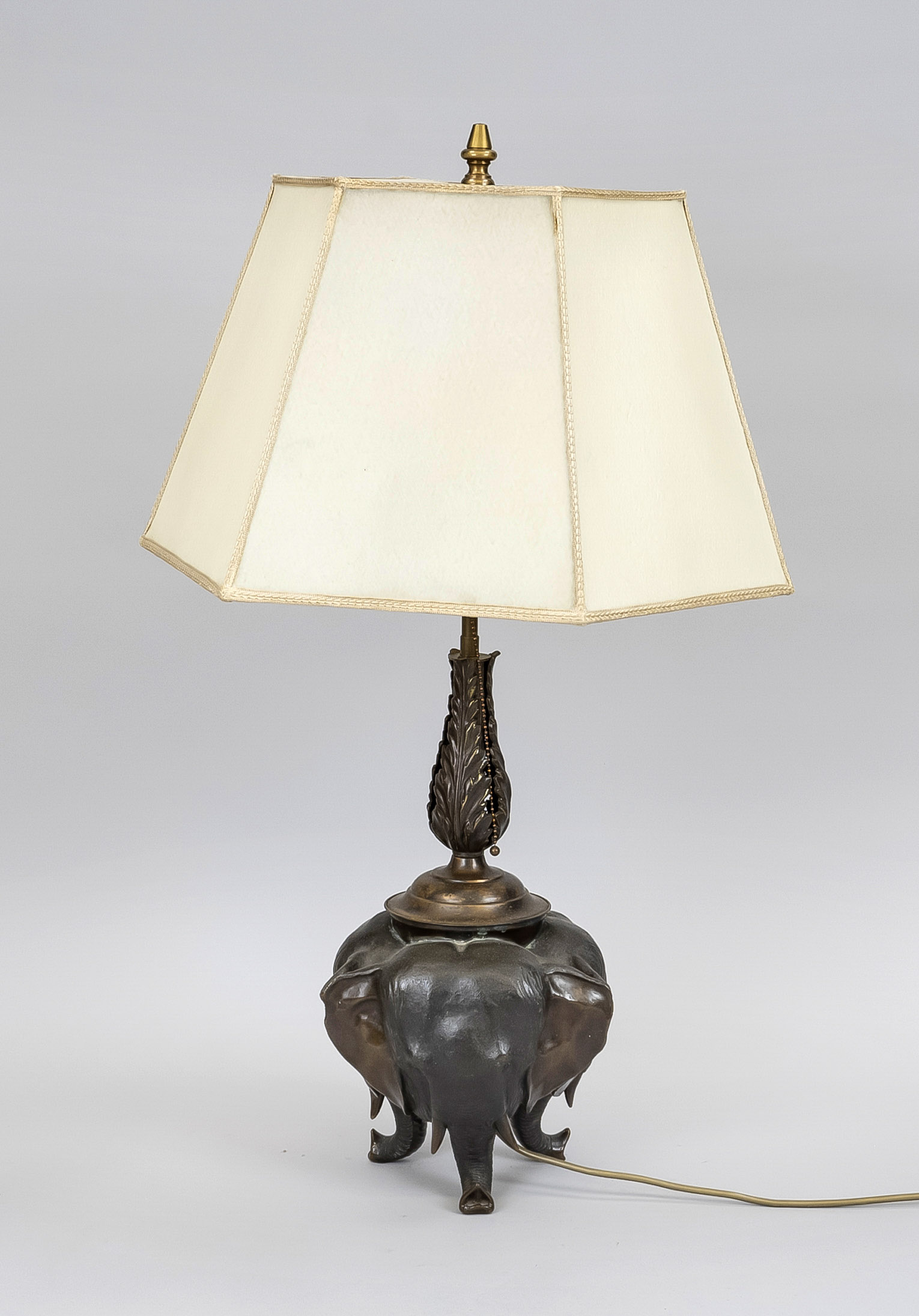 Lamp with elephant base, 20th century, bronze. Three elephant heads standing on their trunks,