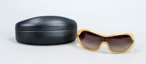 Prada, sunglasses, semi-transparent beige plastic frame with metal applications on the sides and