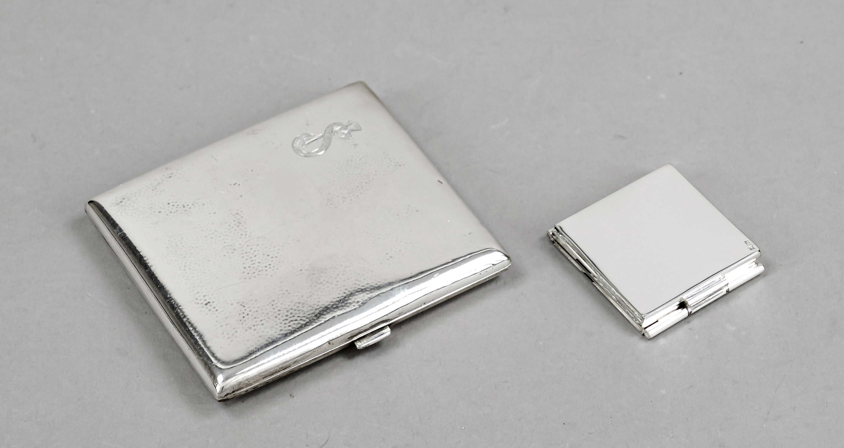 Rectangular cigarette case, German, 20th century, silver 800/000, smooth form, with monogram, l. 8.5