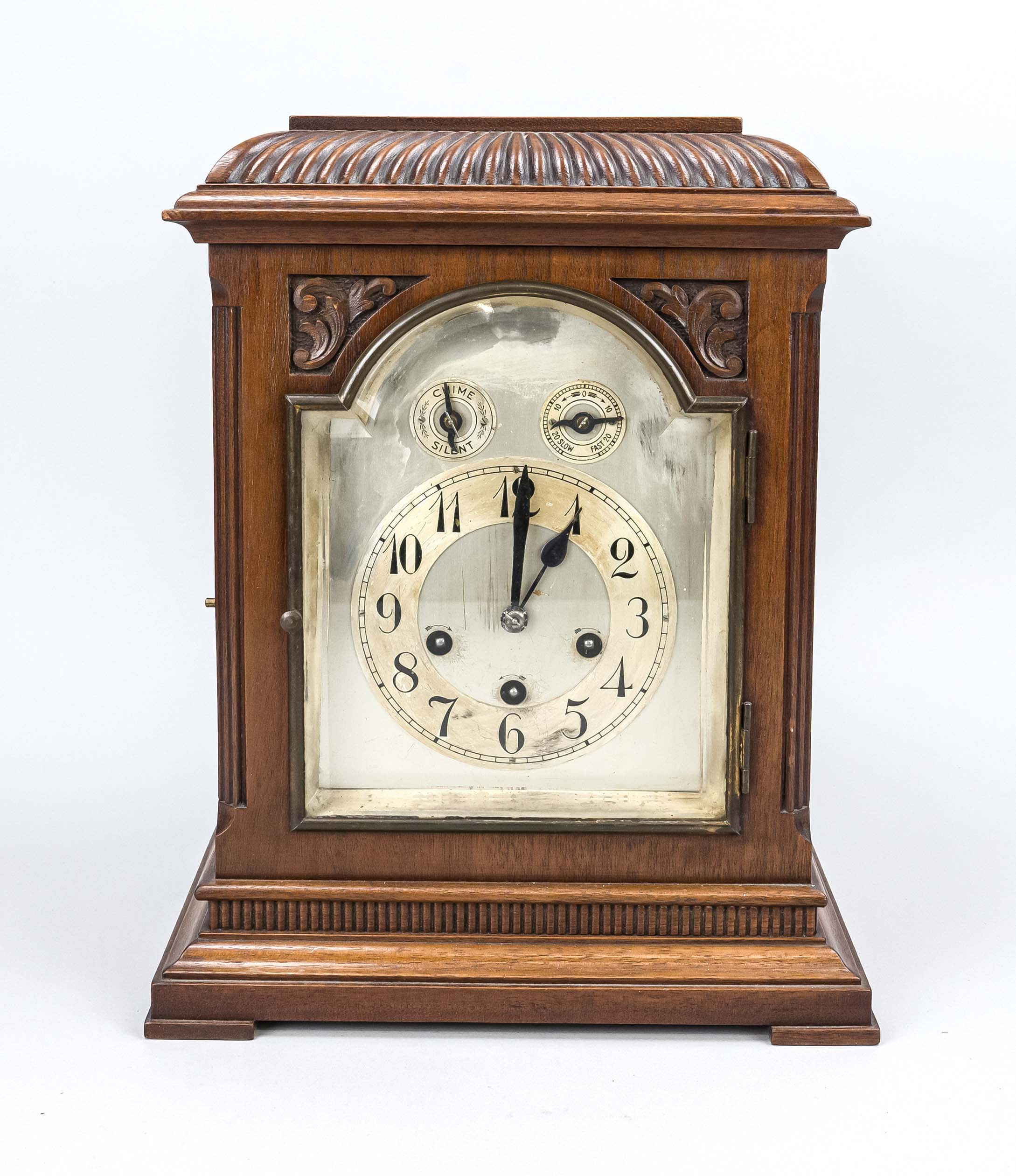 Mahogany table clock, Junghans, 2nd half 19th century, decorated with gallery and carvings such as