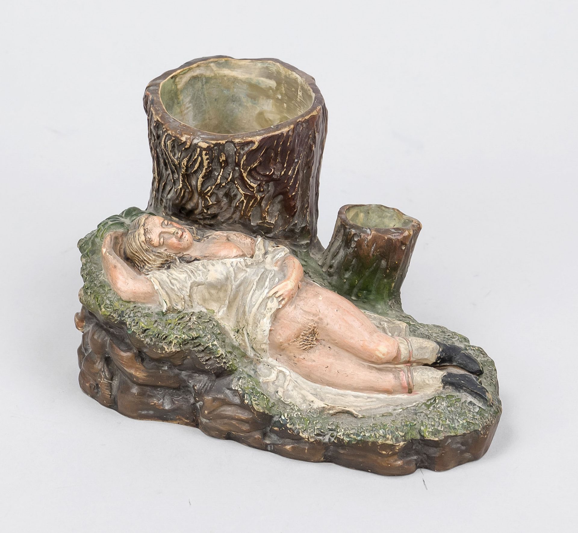 Erotic smoking set, late 19th century, polychrome painted stoneware. Hollow tree stumps as holder