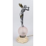 Figurative Art Deco lamp, 1930s. Cast pewter elf on a pink glass globe on a stepped, octagonal base,