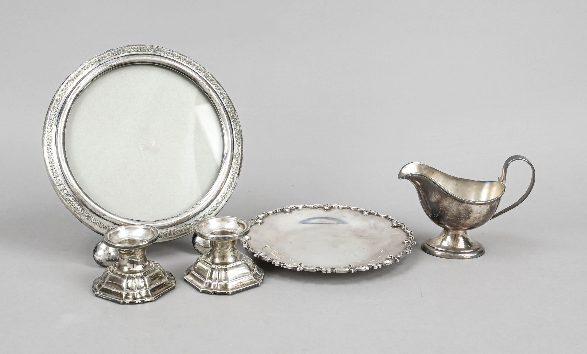 Mixed lot of five pieces, 20th century, silver, various finenesses or tested, round photo stand
