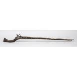 Oriental flintlock rifle, 18th/19th century, barrel and lock probably originally English, numerous