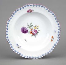 A soup plate, KPM Berlin, c. 1780-1800, 1st choice, shape Königsglatt, cross flowers in blue,