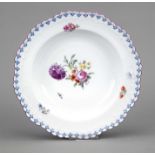 A soup plate, KPM Berlin, c. 1780-1800, 1st choice, shape Königsglatt, cross flowers in blue,