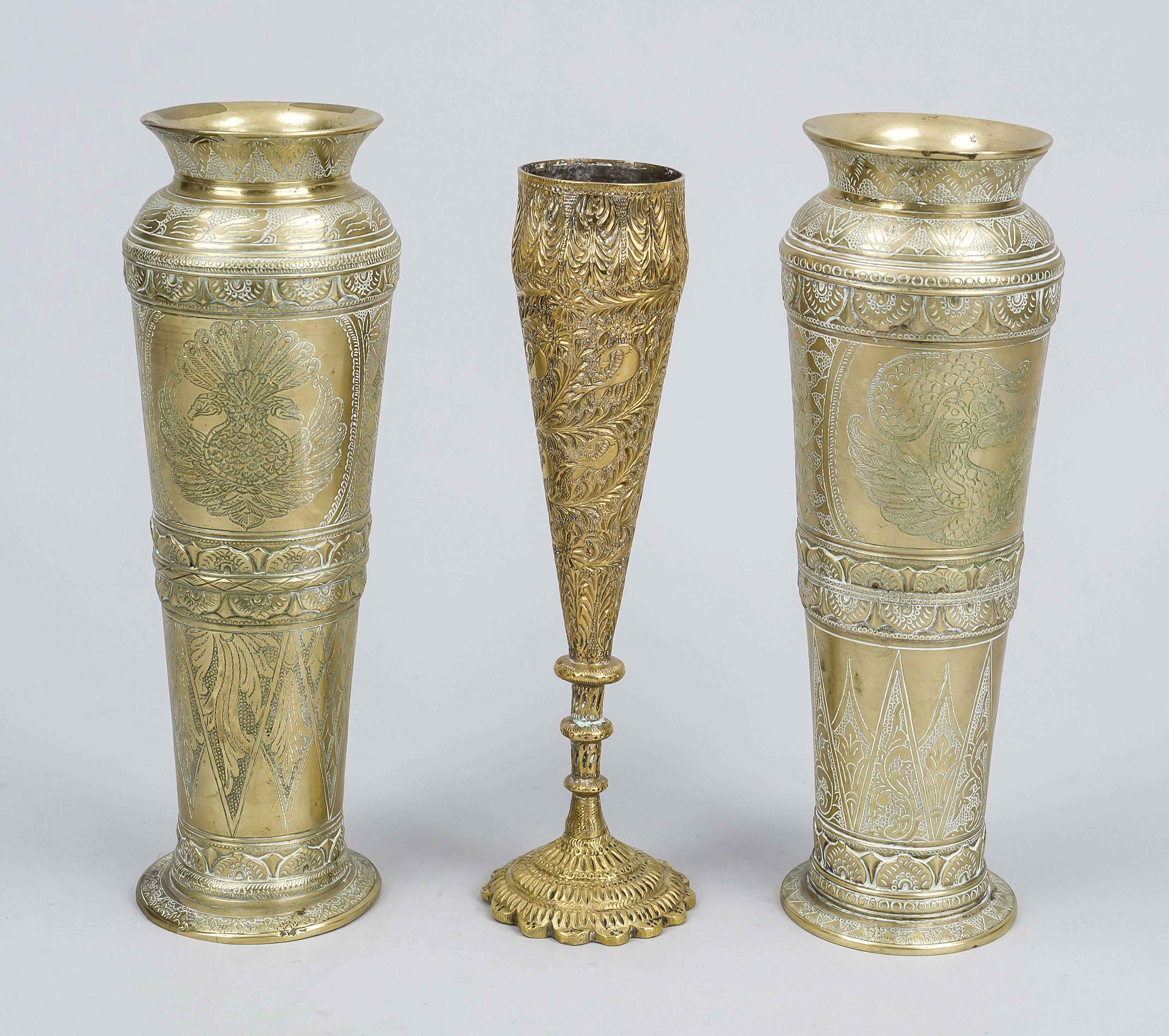 Three brass vases, 19th/20th century, probably Indo-Persian. One pair of vases with fine, engraved