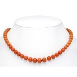 Coral necklace with spring ring, gold-plated metal, strand of coral beads 9 - 5.5 mm in a slightly