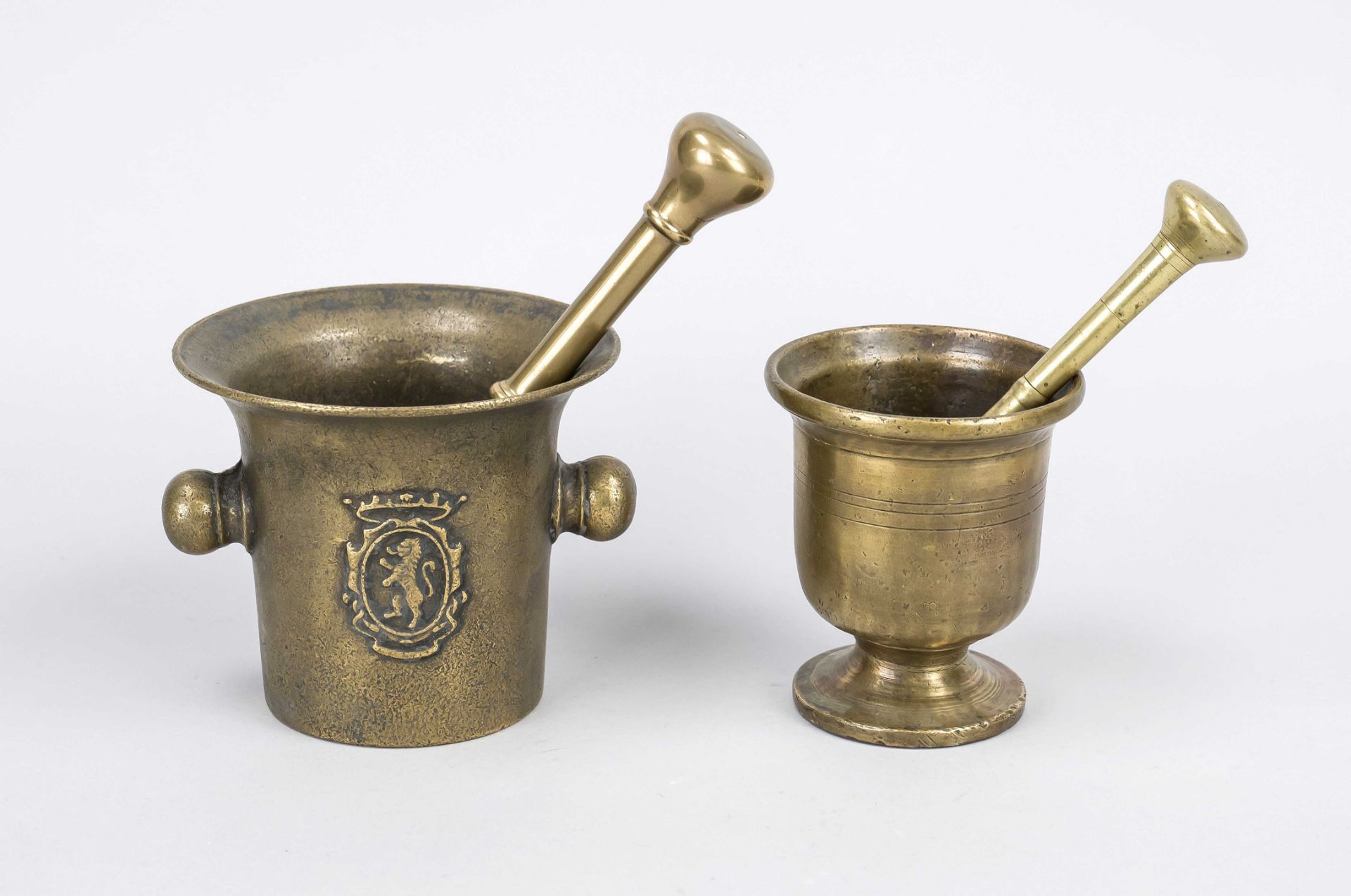 Two old mortars, the smaller one probably pre-1800, bronze, both with pestle, h. up to 12 cm