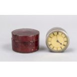 travel clock in case, circa 1900, round nickel case in leather case, gold dial with black Roman