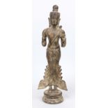 Figure of a standing Buddhist deity, probably Cambodia, exact age uncertain. Bronze with remnants of