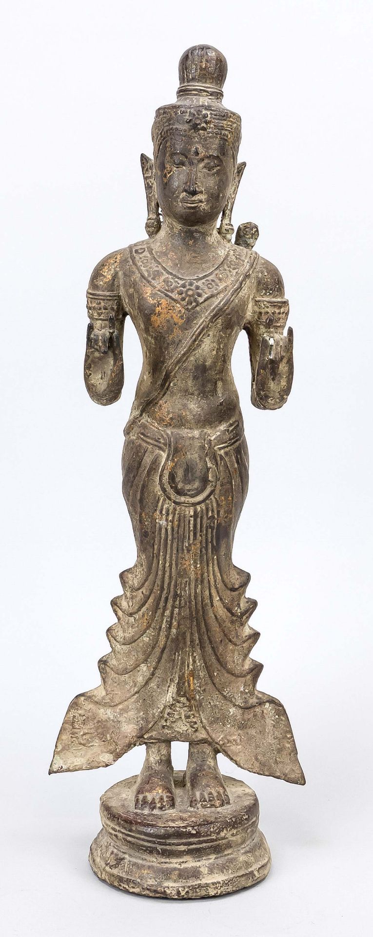 Figure of a standing Buddhist deity, probably Cambodia, exact age uncertain. Bronze with remnants of