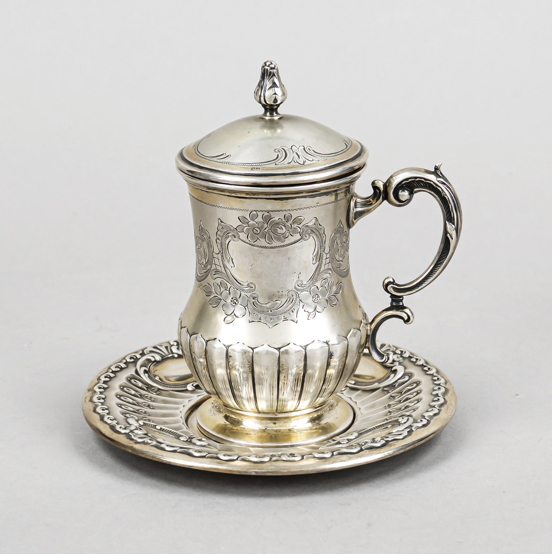 Lidded cup and saucer, hallmarked German and Egyptian, 20th century, silver 800/000, gilt