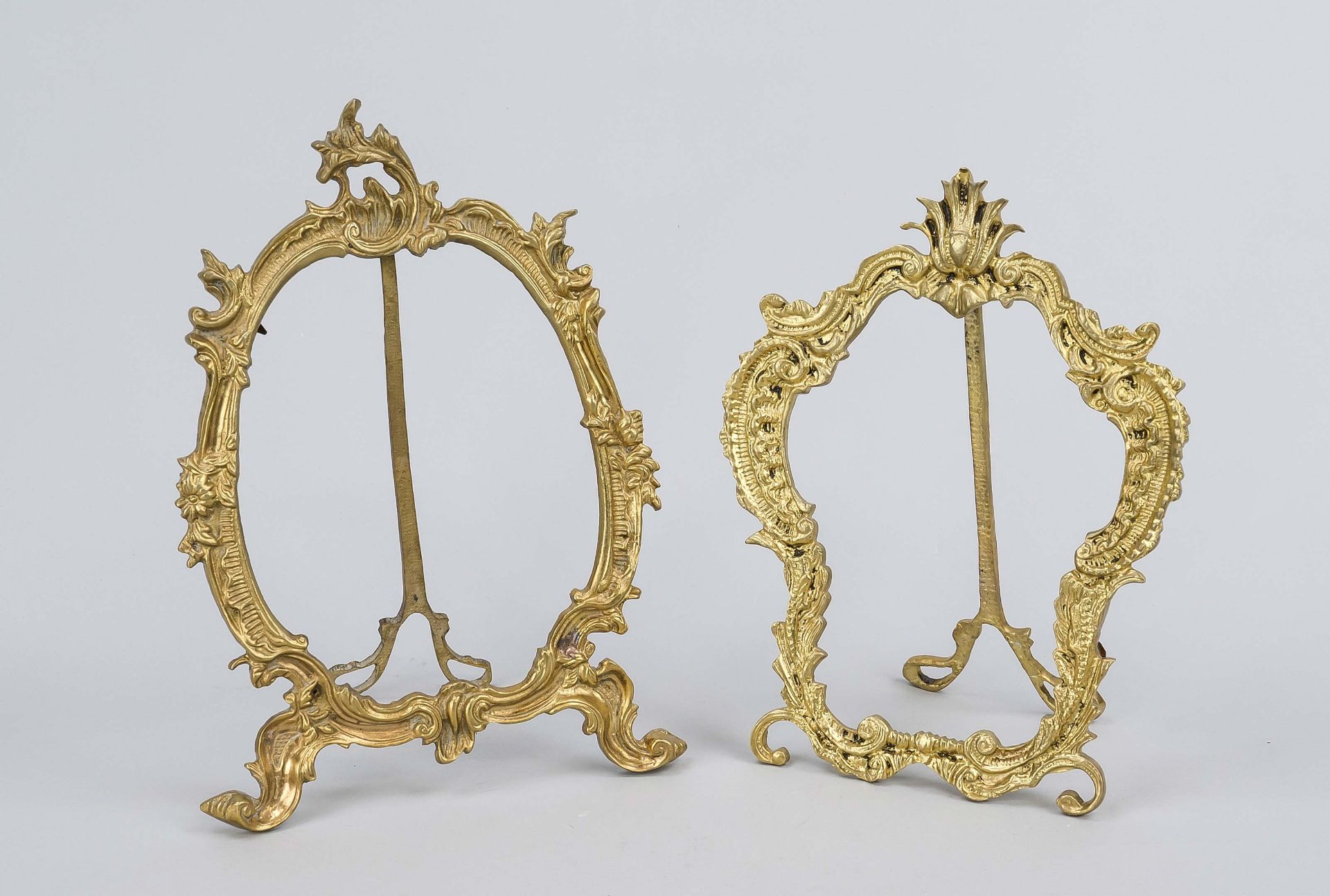 Two statue frames in rococo style, 20th century, yellow cast iron, h. up to 30 cm