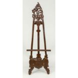 Historicism easel in rococo style, mahogany. Ornamentally carved, pierced in places. Slightly