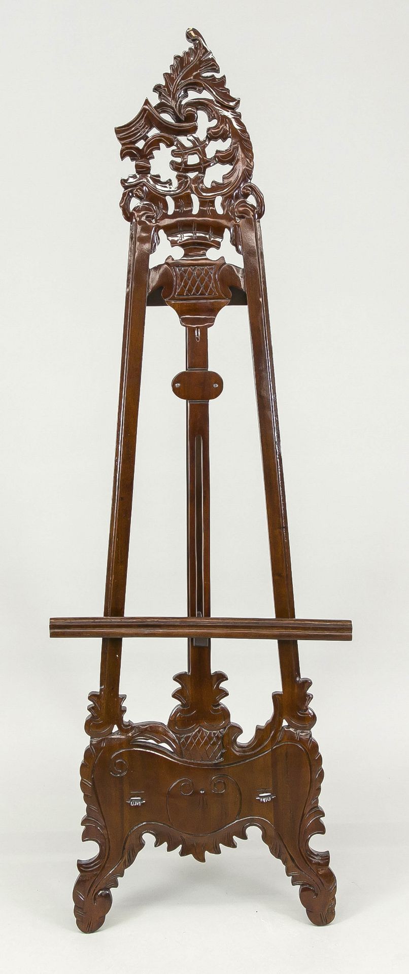 Historicism easel in rococo style, mahogany. Ornamentally carved, pierced in places. Slightly